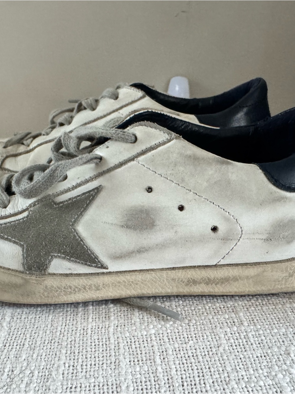 Women’s Golden Goose Superstar Sneakers in white and navy
